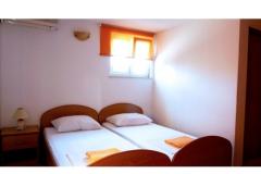 Apartmaji Rodić-Kutleša Soba 8 – S1a foto 1