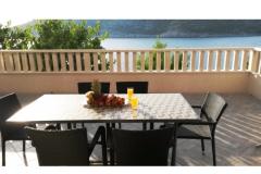  Rajcic apartmani Apartma 2 – A4+1 foto 1