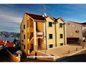 Apartmaji Karlena