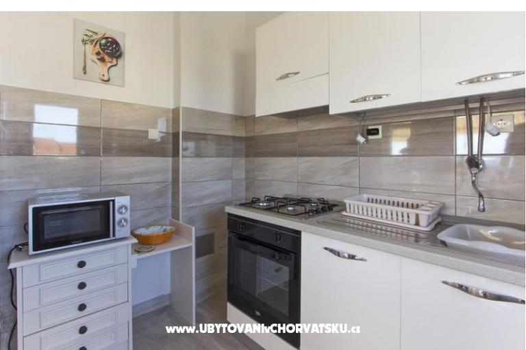 Apartmaji Nella – foto 11